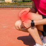 Piękny młodzieniec na medalu 10. PKO Białystok Półmaratonu